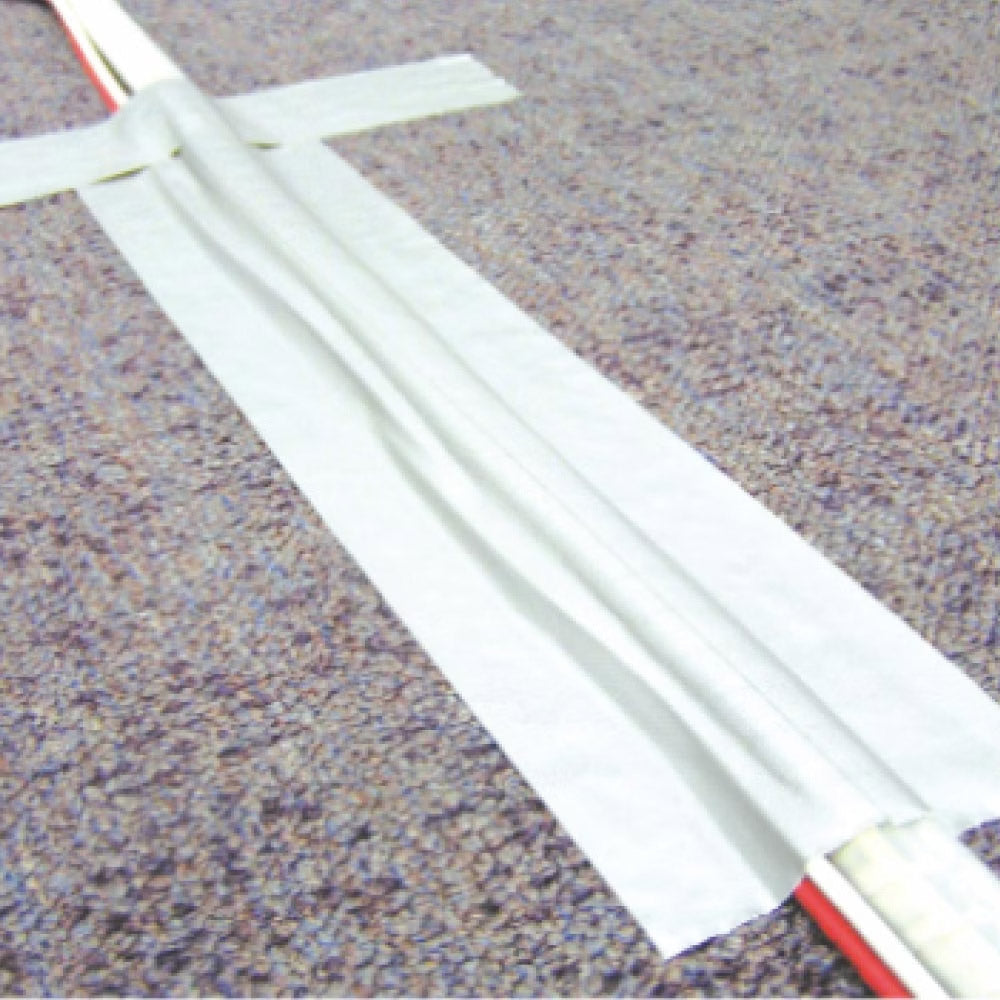 GTM-550LGN - Matte Gaffa Tape, Light Green securing cables on floor