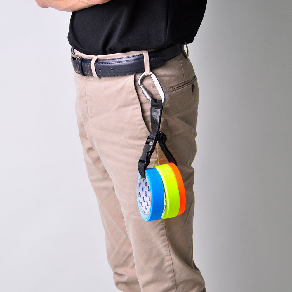 GT-2540BK - Gaffer Tape Holder Strap with Spring Hook, Black worn on belt front view