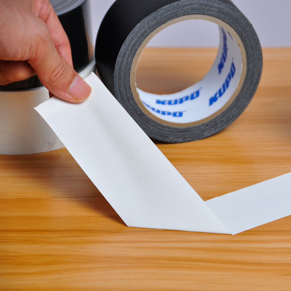 GTM-515B - Matte Gaffa Tape, Black adhesive removal from table