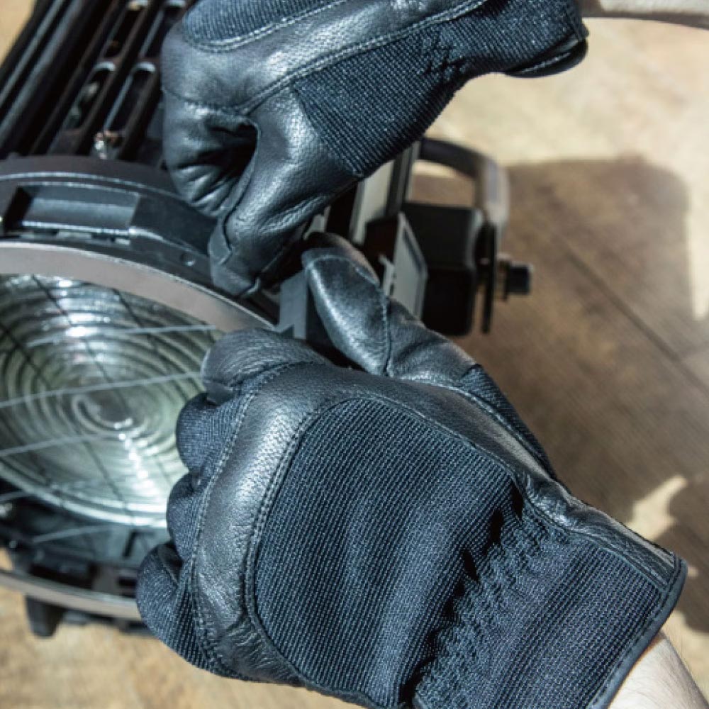 KH-55LB - KU-Hand Grip Glove, Large handling a lighting fixture
